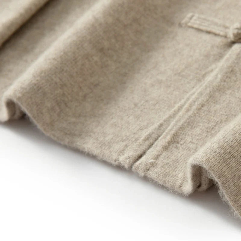 Elegant men's long sleeve knit cardigan. Comfortable, refined fit for smart casual and versatile everyday wear.