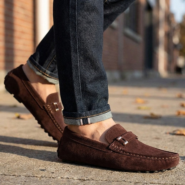 Classic men's slip-on loafers in premium material, ideal for business casual and everyday wear. Comfortable men's shoes.