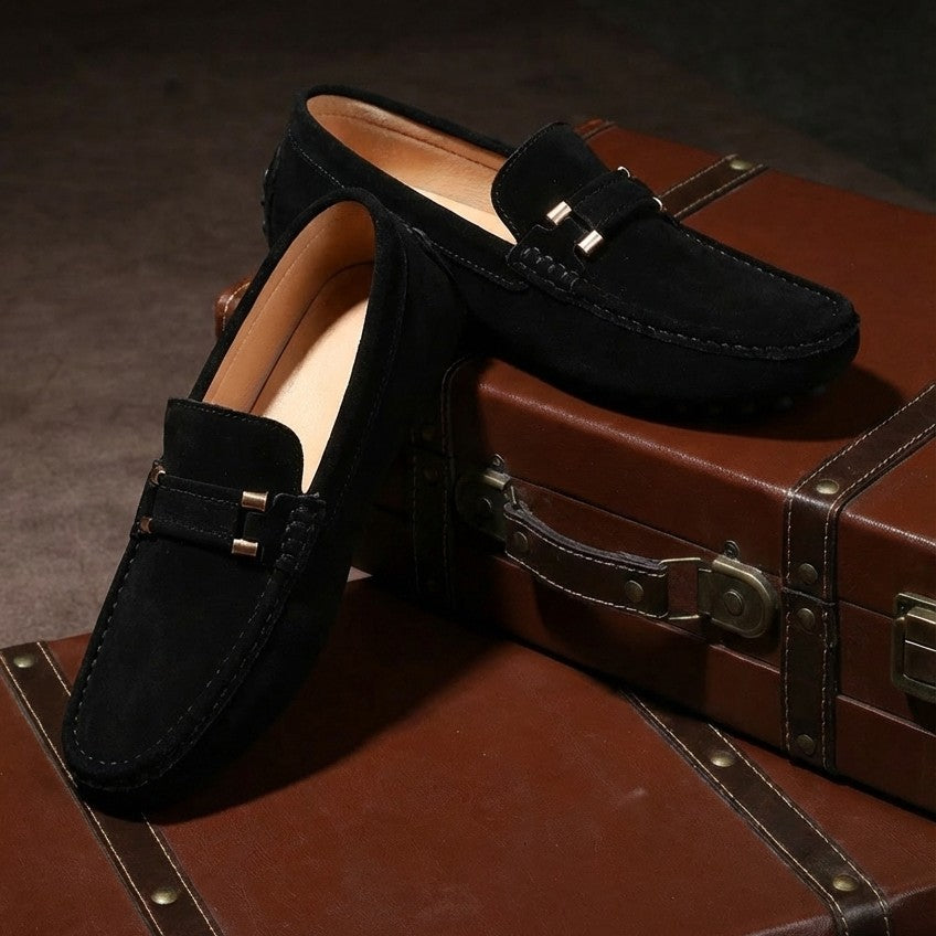 Close-up of men's refined slip-on loafers, showcasing quality and classic design. Comfortable & versatile men's footwear.