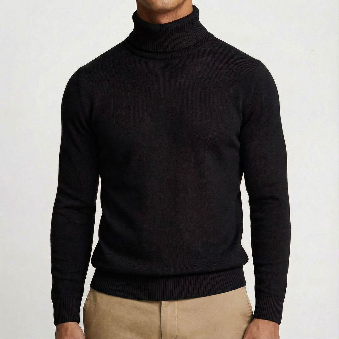 Elegant men's turtleneck sweater worn under a blazer, perfect for versatile, warm winter fashion.