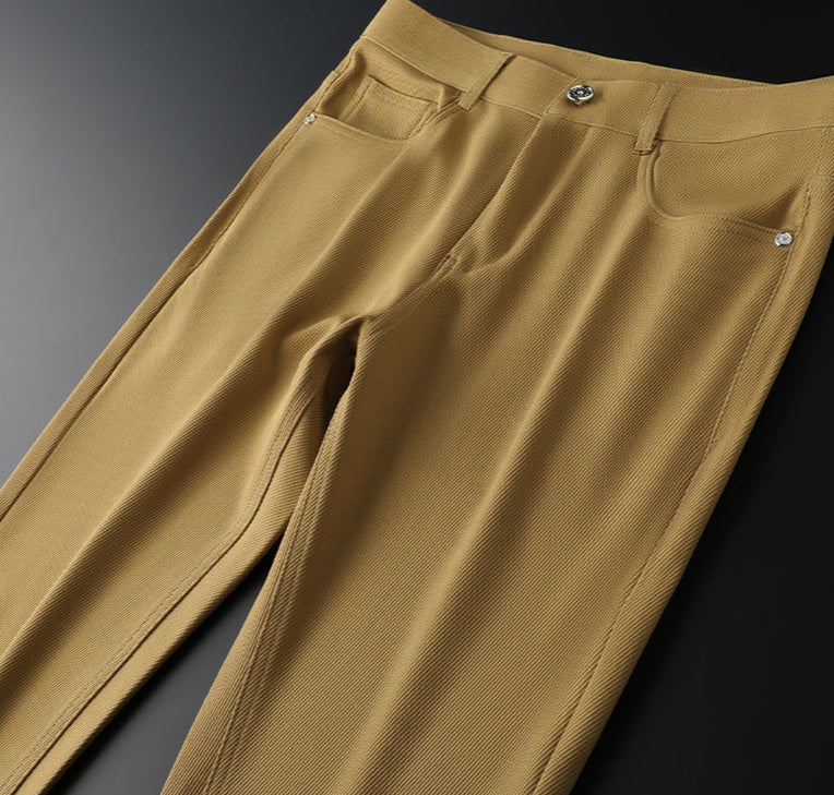 Elegant men's dress pants, refined woven material, sophisticated for office or events.
