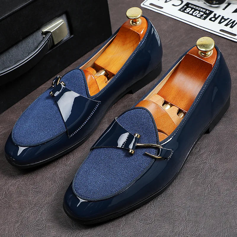 Men's Regal black leather loafers. Sophisticated slip-on dress shoes for a polished, elegant look.