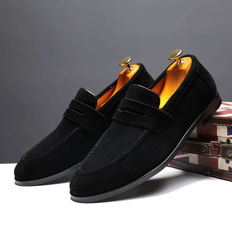 Modern men's slip-on loafers with a sleek design, perfect for a refined look in men's fashion.