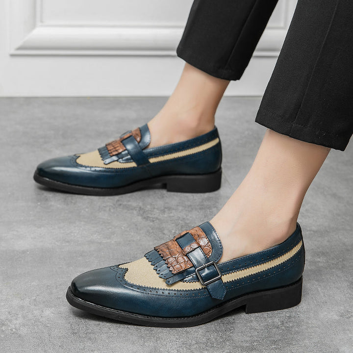 Handcrafted men's brogue loafers, elegant slip-on design with a distinctive fringe.