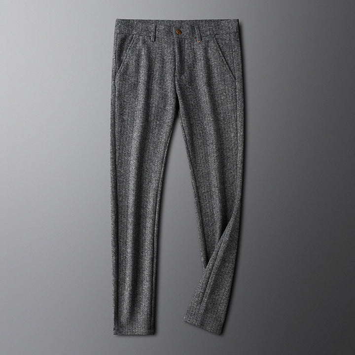 Detail of Regent tailored trousers waistband & button, showcasing premium quality & comfortable design.