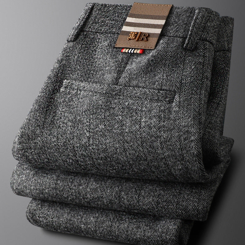 Seated man in Regent tailored trousers, highlighting comfort & sophisticated style for business or casual pants.