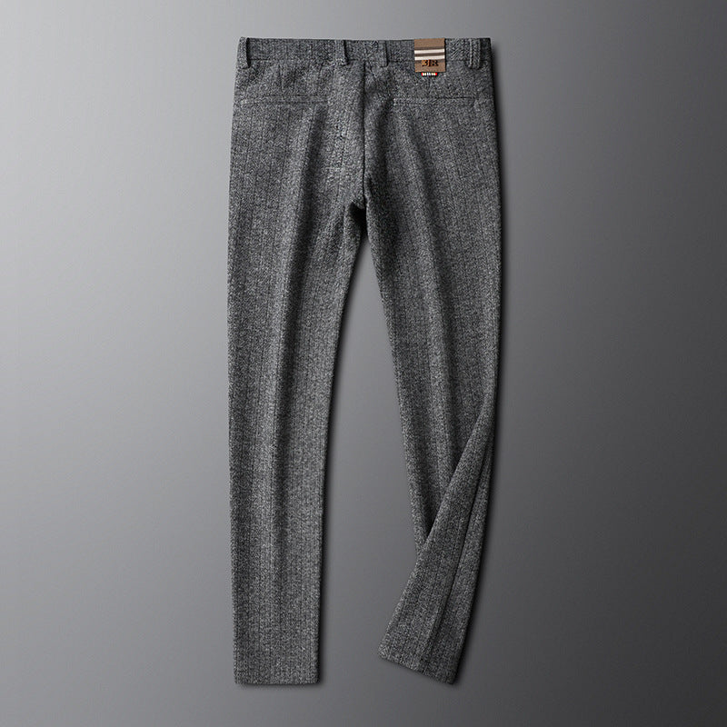 Regent tailored men's trousers styled casually with a shirt, emphasizing versatility for modern men's fashion.