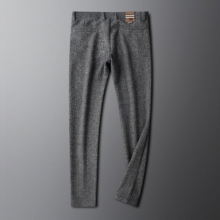 Regent tailored men's trousers styled casually with a shirt, emphasizing versatility for modern men's fashion.