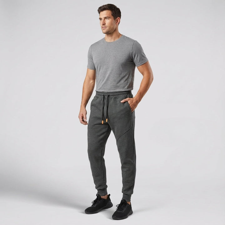 Close-up of the fleece lining inside men's regular fit polyester jogging pants, warm for winter.