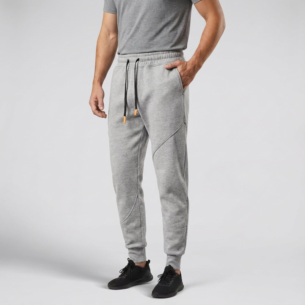 Model wearing men's regular fit jogging pants, showing comfortable fit and casual style.