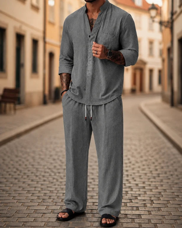 Comfortable men's relaxed-fit shirt and pants set. Versatile 2-piece casual outfit, great for summer or lounging.