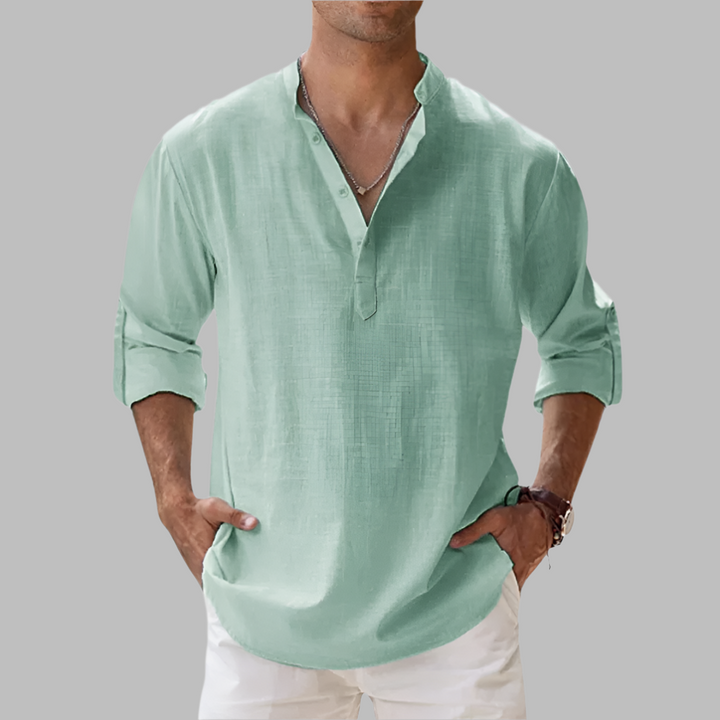 Enjoy warm weather in this men's relaxed fit band collar shirt, perfect for casual outings.