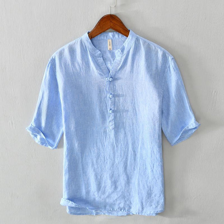 Breathable men's banded collar casual top in a relaxed fit, ideal for warm weather and a modern look.