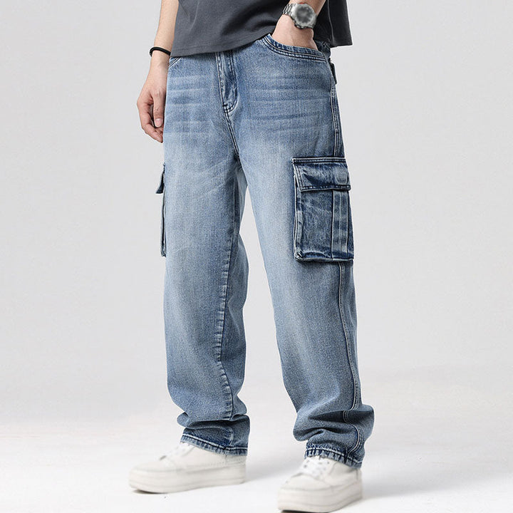 Durable men's relaxed fit cargo jeans with multi-pockets, perfect utility pants for everyday.