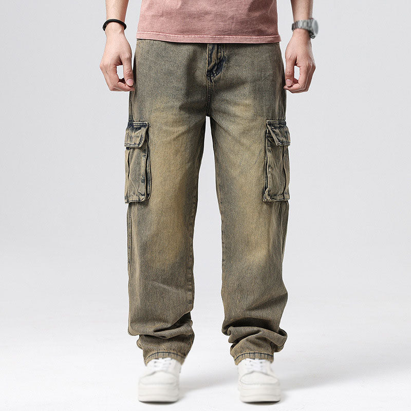 Men's relaxed fit cargo jeans in a casual pose, showcasing comfort & versatility for men's fashion.