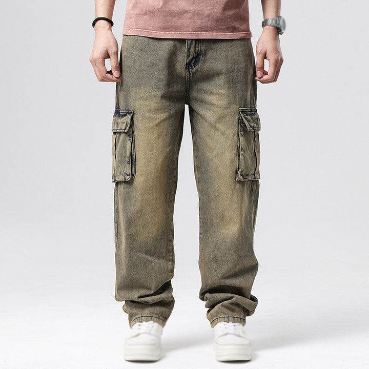 Men's relaxed fit cargo jeans in a casual pose, showcasing comfort & versatility for men's fashion.