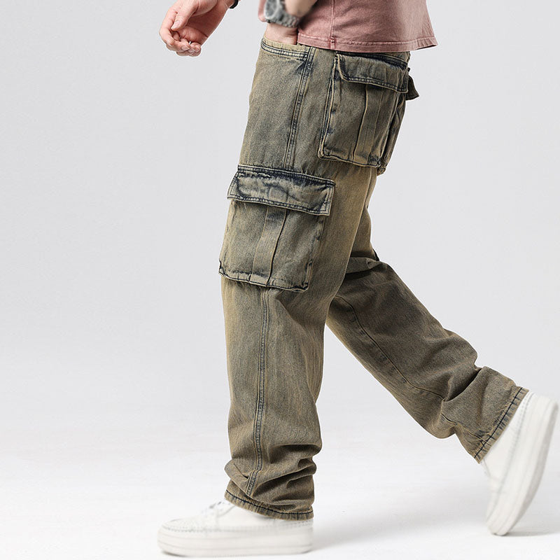 Back view of comfortable men's relaxed fit blue cargo jeans, highlighting casual style & durable design.