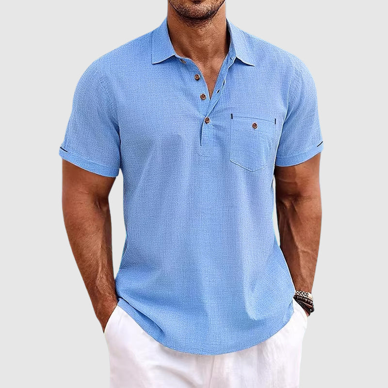 Men's relaxed fit breathable summer polo shirt, short sleeve, button-up, perfect for casual coastal vacation wear.