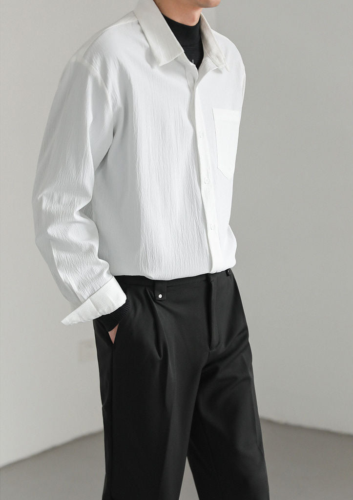 Collar detail of a men's comfortable relaxed fit long-sleeve button-up shirt, perfect for casual everyday fashion.