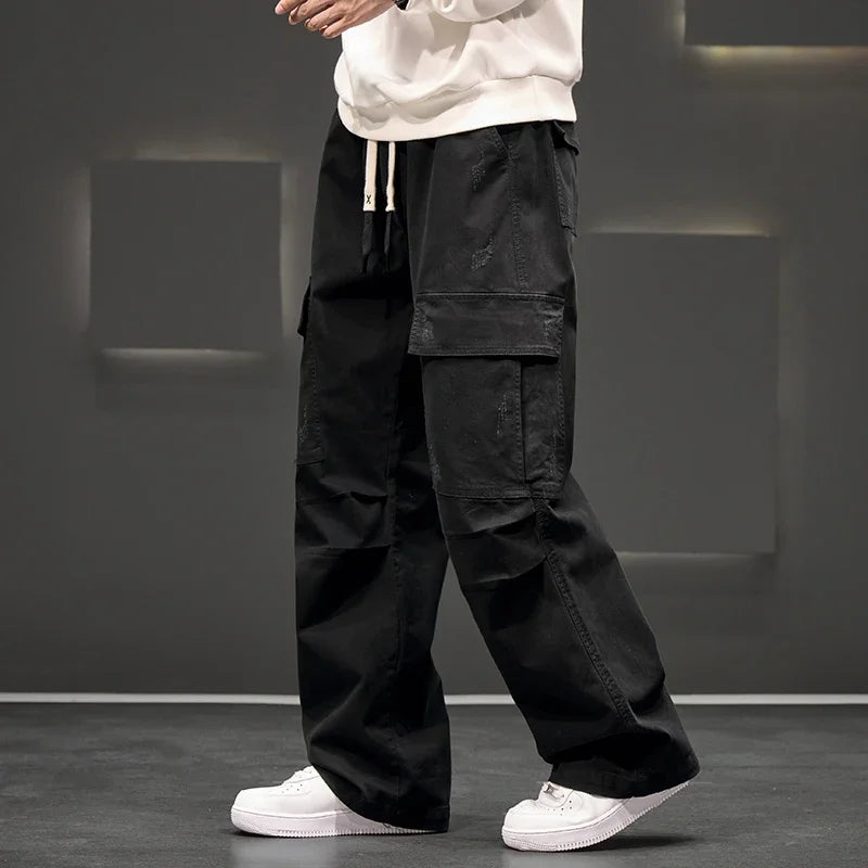 Stylish men's utility pants with multiple pockets, ideal for casual wear and outdoor activities.