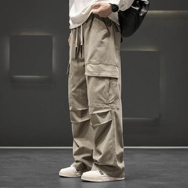 Men's casual cargo pants, relaxed fit with drawstring waist for comfort and versatile everyday style.