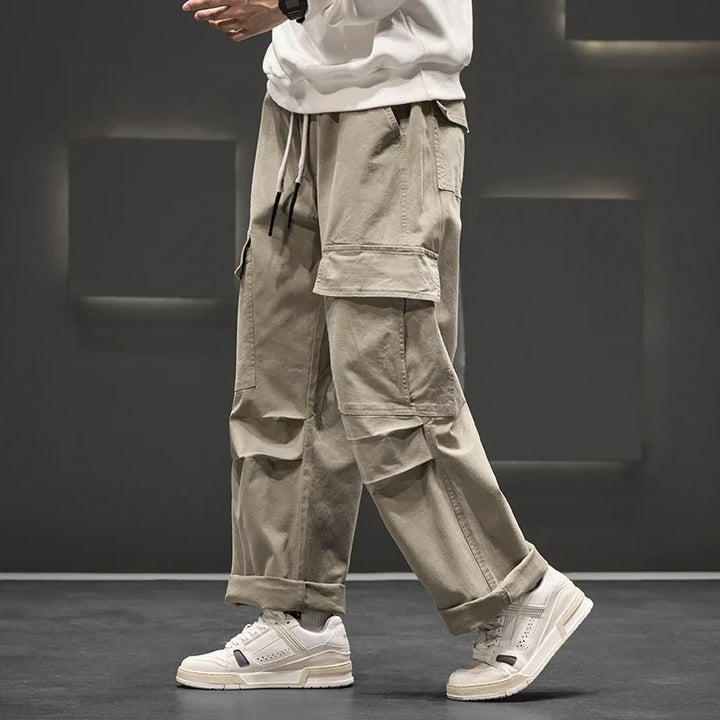 Functional men's utility cargo pants, relaxed fit, durable for workwear and active outdoor use.