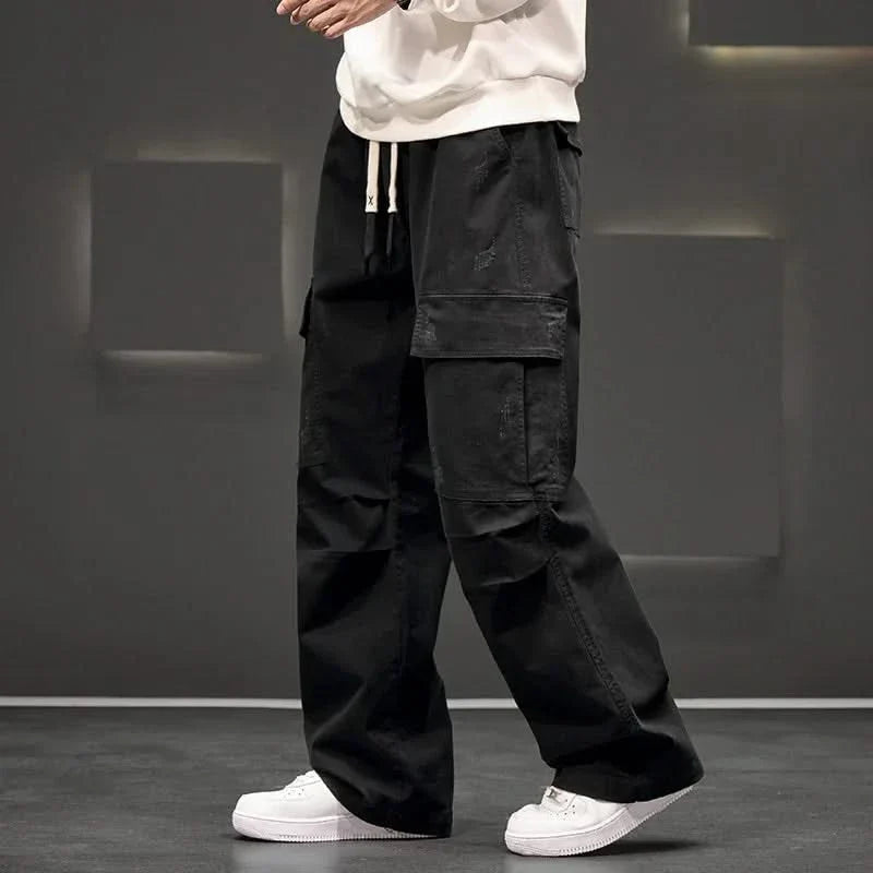Khaki men's relaxed fit cargo pants, ideal for casual wear, featuring a drawstring waist & practical multi-pockets.