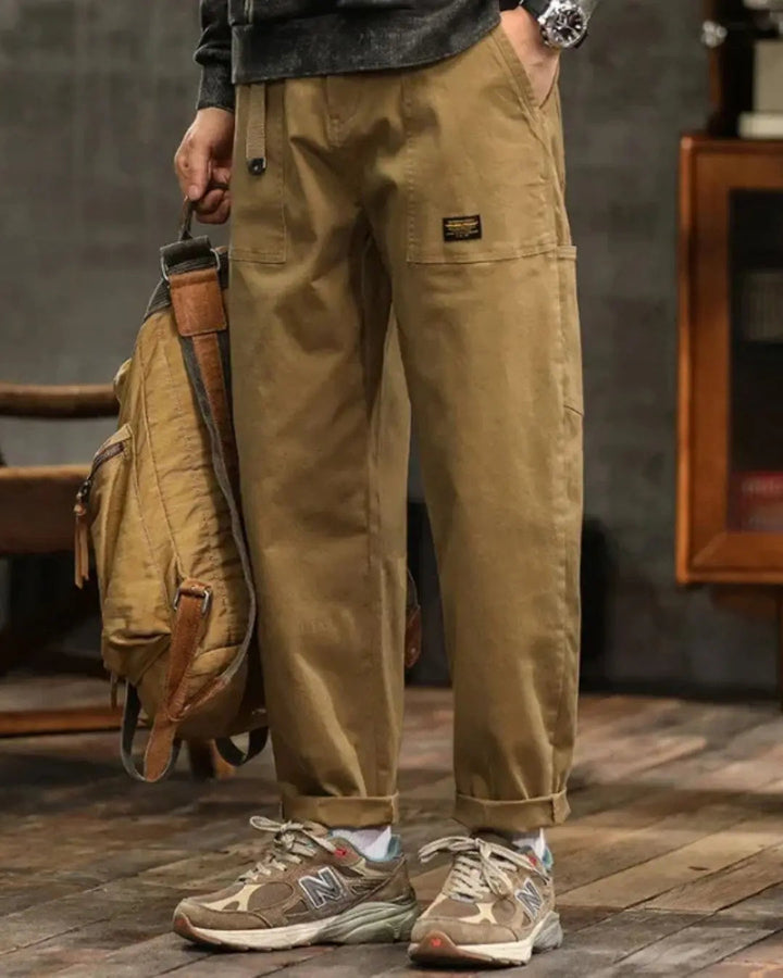 Durable men's cargo pants featuring practical multi-pockets, great for utility & outdoor use.