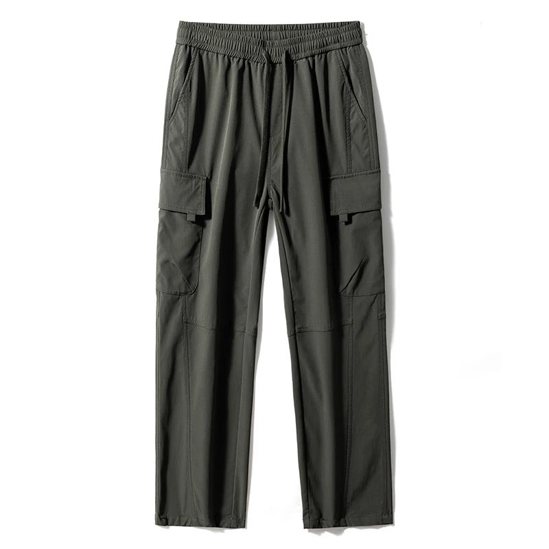 Side view: Men's multi-pocket relaxed fit cargo pants, highlighting practical utility features for everyday wear.