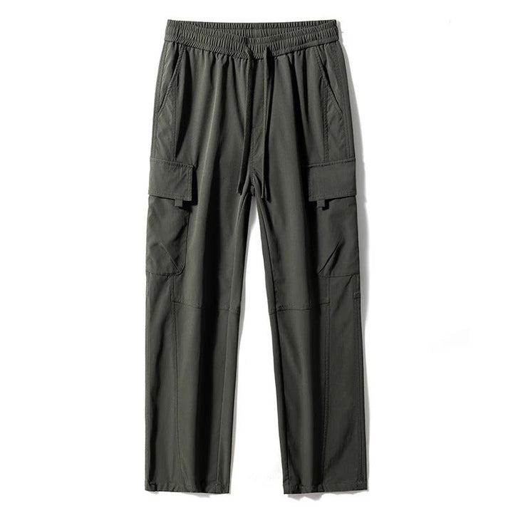 Side view: Men's multi-pocket relaxed fit cargo pants, highlighting practical utility features for everyday wear.