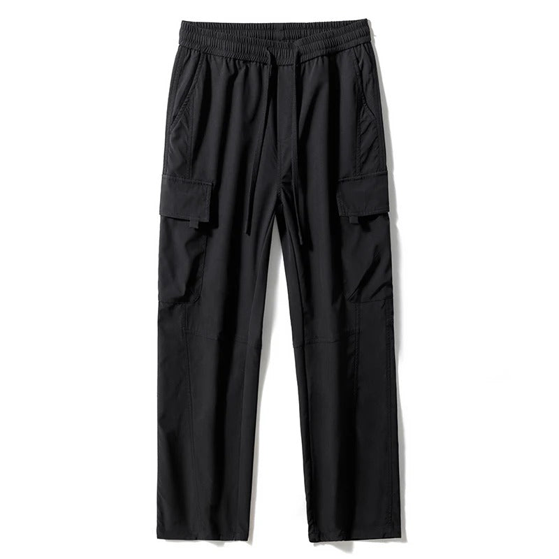 Back view: Men's relaxed fit cargo pants, showing utility pockets, comfortable design, and casual appeal.