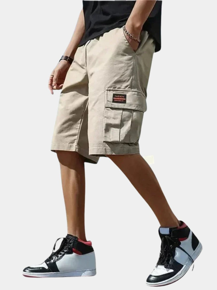 Men's relaxed fit cargo shorts, ideal for summer comfort & casual wear. Features multiple utility pockets.