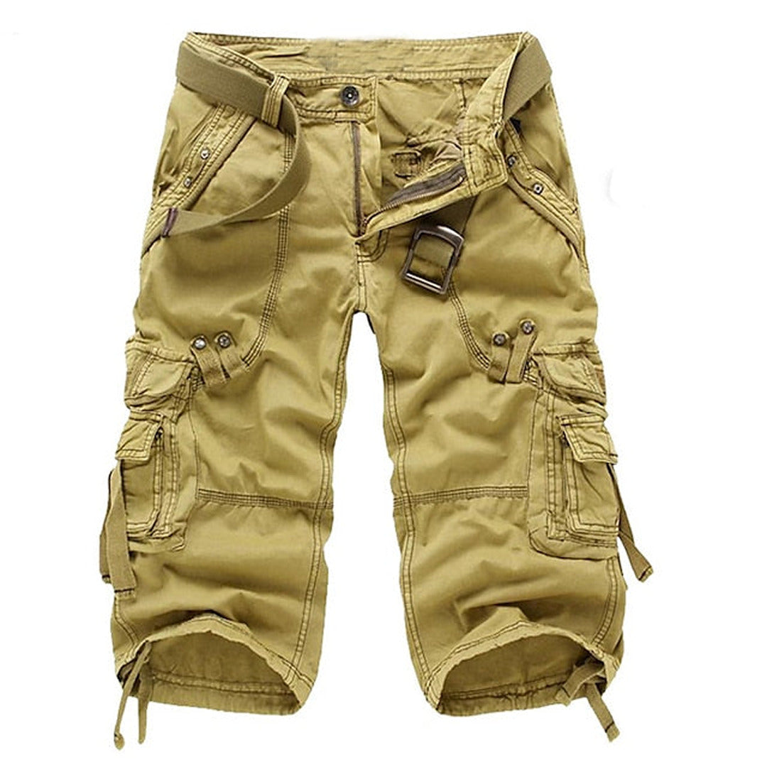 Comfortable men's relaxed fit utility shorts featuring multiple pockets for adventure-ready outdoor and casual wear.