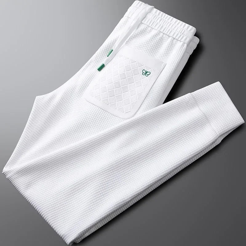 Relaxed fit men's casual pants designed for comfort and ease, suitable for modern everyday style.