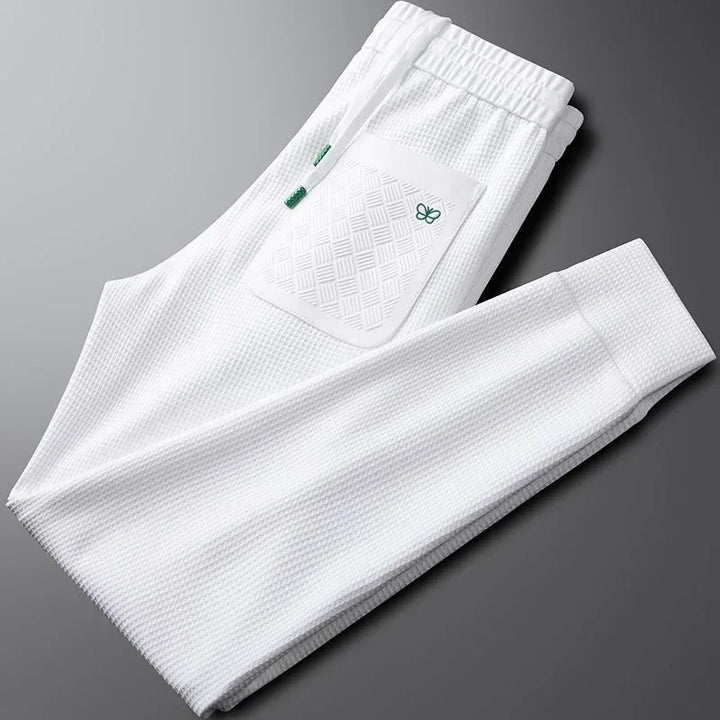 Relaxed fit men's casual pants designed for comfort and ease, suitable for modern everyday style.