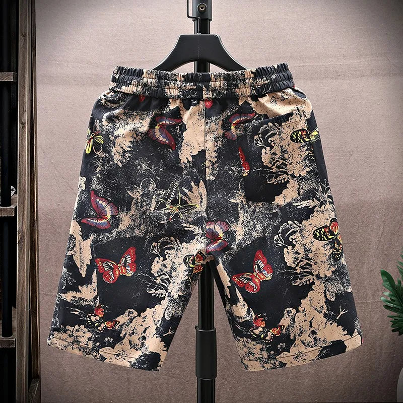 Men's floral patterned drawstring shorts, relaxed fit, ideal for summer, easy care & fade resistant.