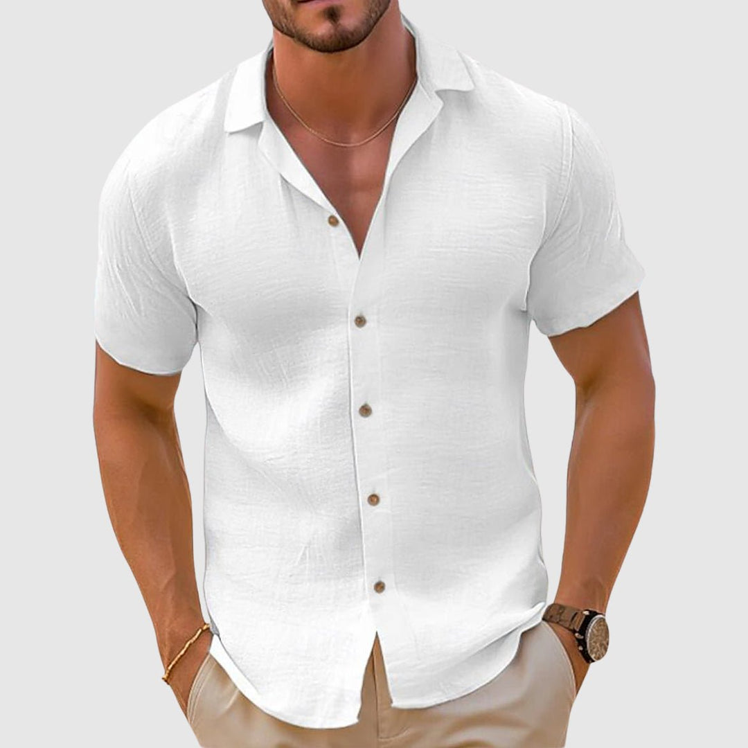 Close-up of breathable fabric on men's relaxed fit collared shirt, ensuring summer comfort and casual style.