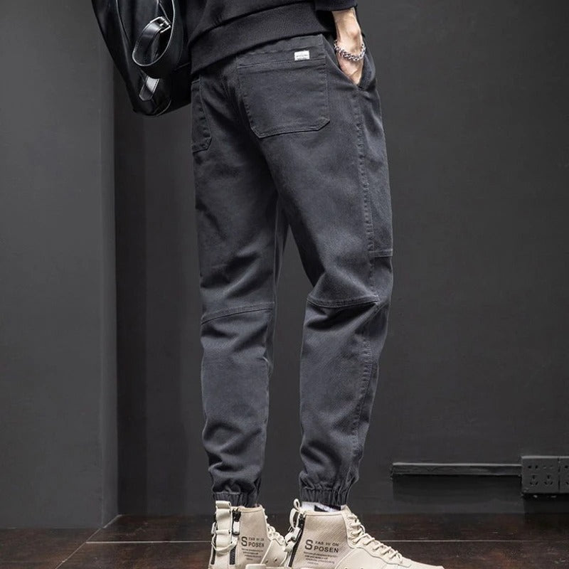 Stylish men's tapered fit joggers with drawstring waist, ideal relaxed pants for daily casual outfits.