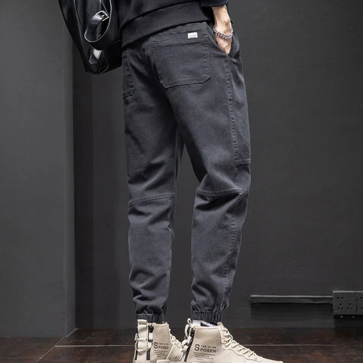 Stylish men's tapered fit joggers with drawstring waist, ideal relaxed pants for daily casual outfits.