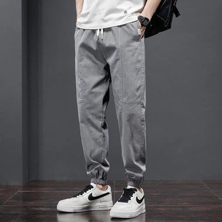 Men's athletic-style comfort joggers, cotton blend, relaxed fit with drawstring, great for active casual wear.