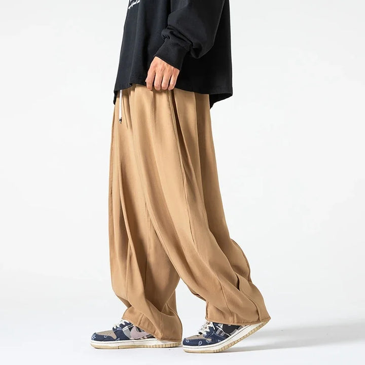 Khaki men's relaxed fit lounge pants. Comfortable casual pants for everyday fashion & relaxation.