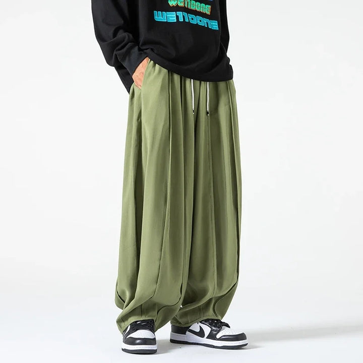 Green men's relaxed fit comfort pants. Versatile lounge pants for men's everyday fashion & leisure.