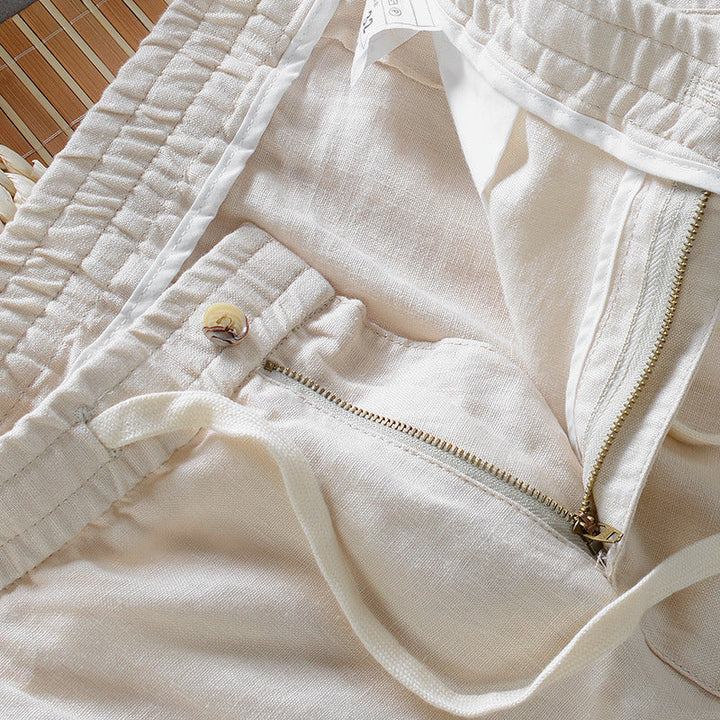 Men's relaxed fit comfort pants, featuring a drawstring waist for a casual, adaptable look and feel.