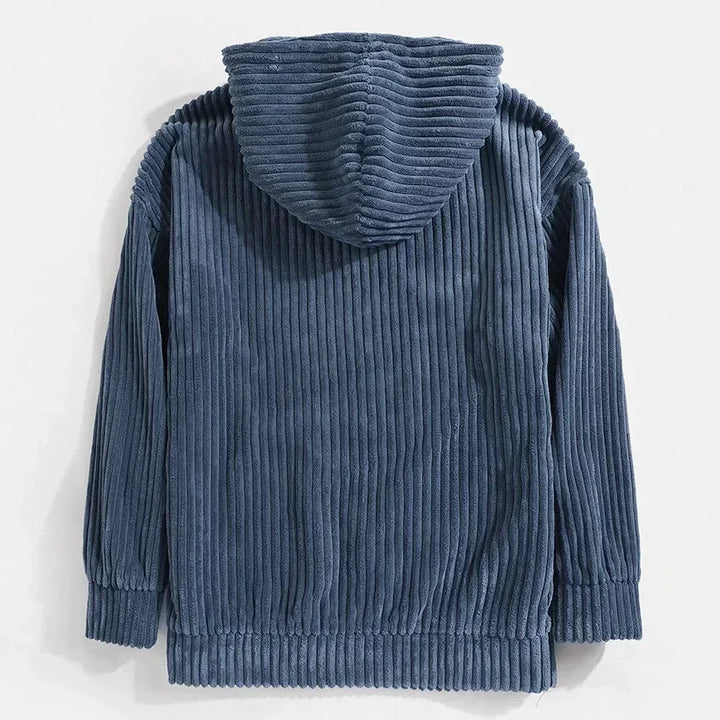 Close-up of soft corduroy texture on a men's relaxed fit hoodie, perfect for casual fall style.