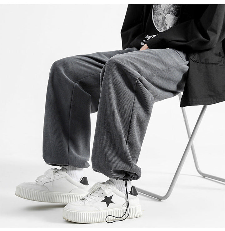Drawstring waist men's corduroy pants, relaxed fit, for comfortable casual style.