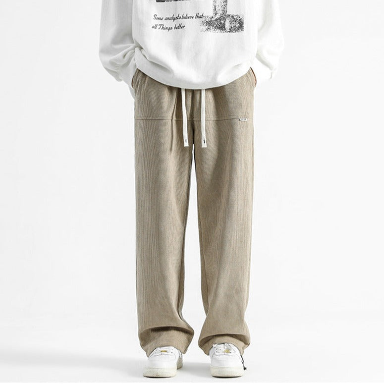 Men's casual drawstring corduroy pants, relaxed fit, for comfortable all-season fashion.
