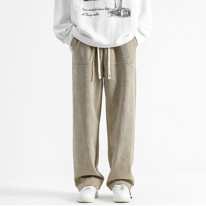 Men's casual drawstring corduroy pants, relaxed fit, for comfortable all-season fashion.
