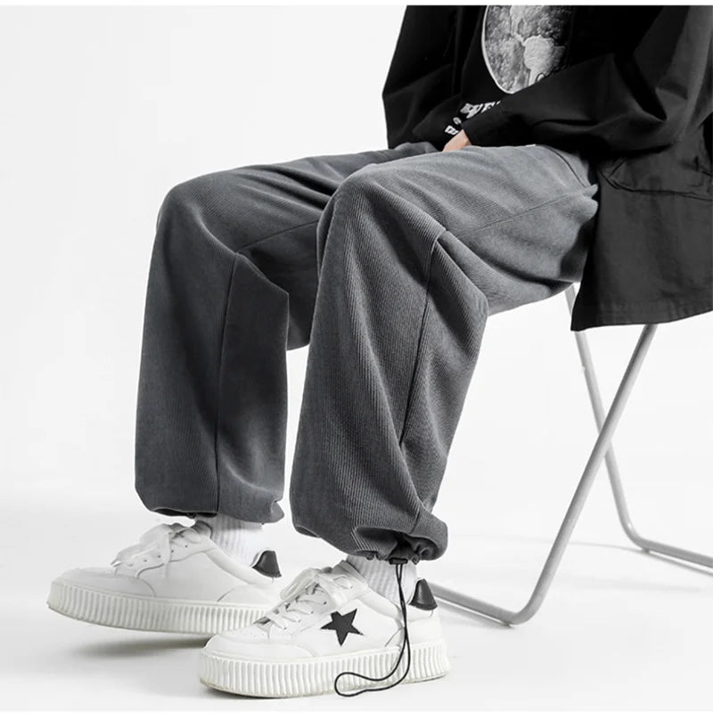 Relaxed men's corduroy bottoms for all-season style & comfort, drawstring waist.
