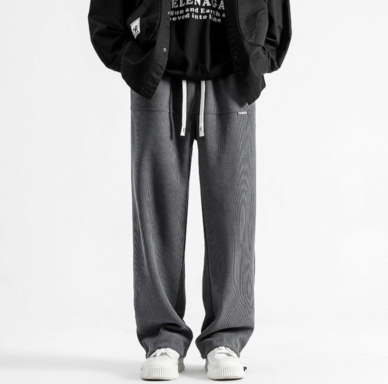 Stylish men's relaxed corduroy pants with drawstring, perfect for casual outfits.