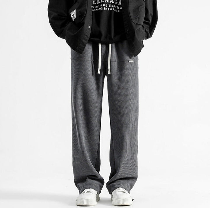 Stylish men's relaxed corduroy pants with drawstring, perfect for casual outfits.